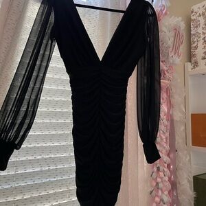 Elegant Black Dress with Sheer Sleeves